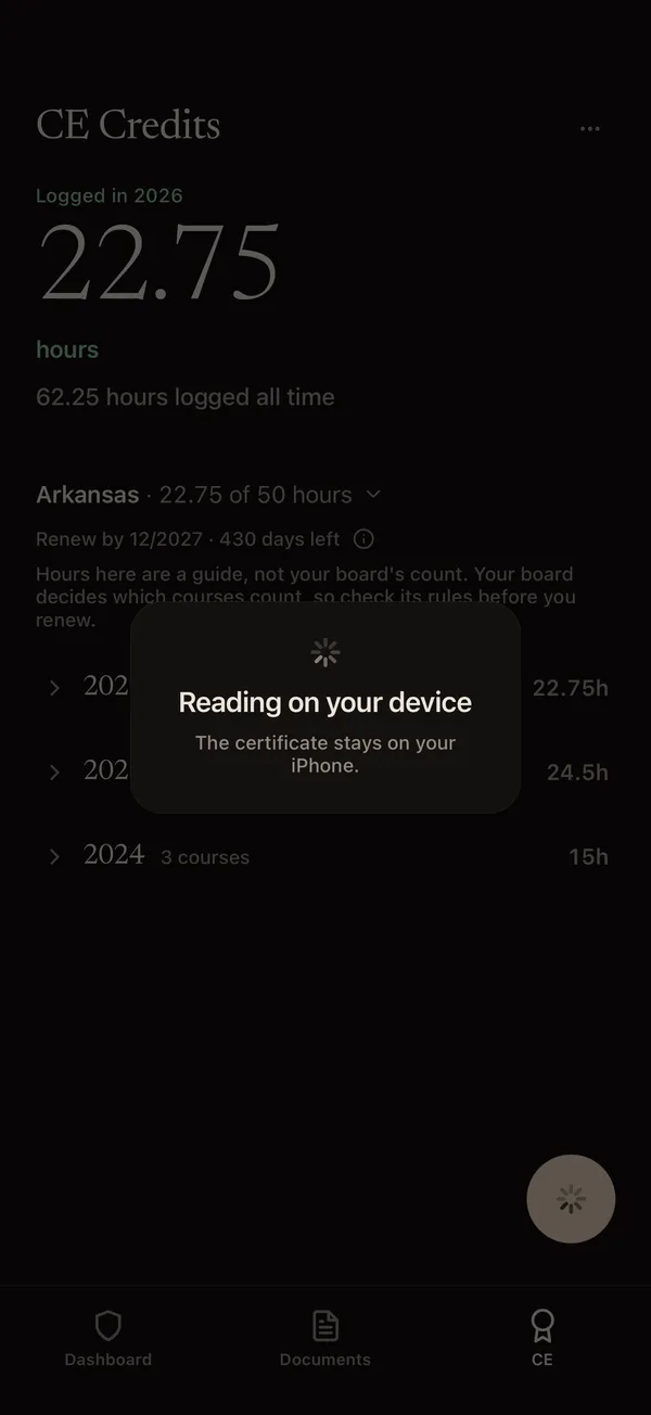 The DentKey CE screen while a certificate is read, with a card that says Reading on your device